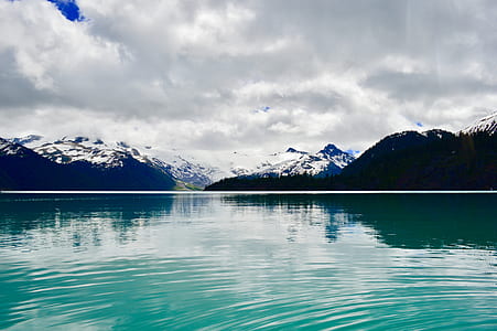 mountain near body of water thumbnail