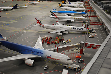 white and blue airliner planes thumbnail