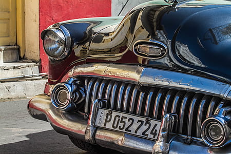 closeup photo of classic black vehicle thumbnail