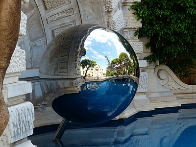 photo of mirror ball near white concrete post thumbnail