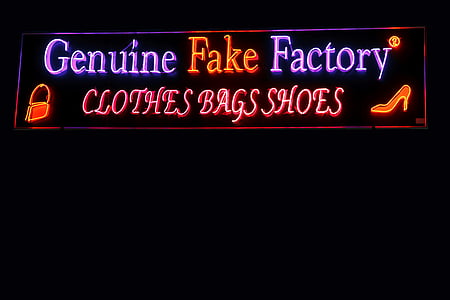 Genuine Fake Factory neon signage turned on thumbnail