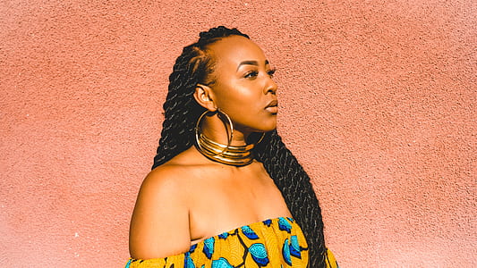 woman wearing yellow and blue floral off-shoulder shirt thumbnail
