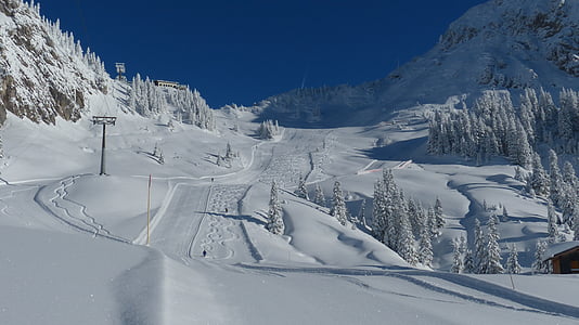 snowfield during day time thumbnail
