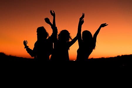 silhouette of women during sunset thumbnail