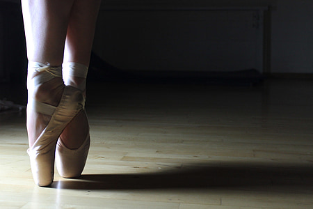 person wearing white ballet shoes doing ballet dance thumbnail