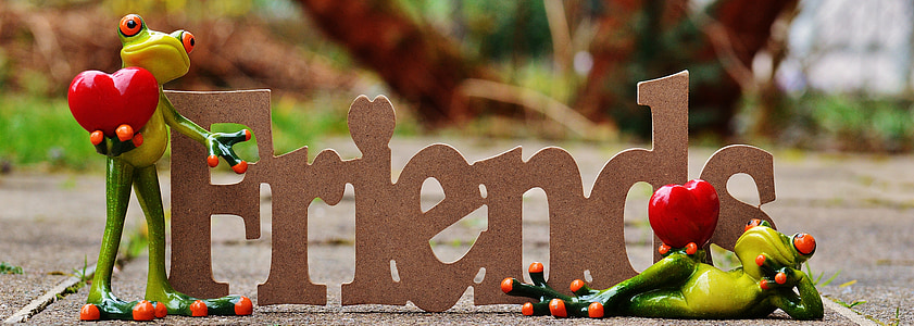 brown Friends free standing letters on gray concrete floor thumbnail