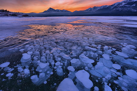 ice glaciers under dark sky thumbnail