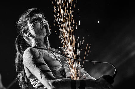 Grayscale Photography of Woman With Spraklers thumbnail