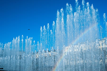 water fountain under rainbow thumbnail