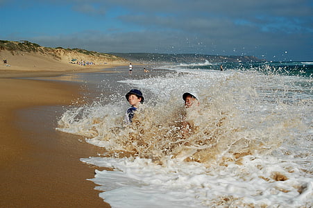 two person on beach at daytime thumbnail