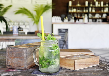 clear glass mason jar near box thumbnail