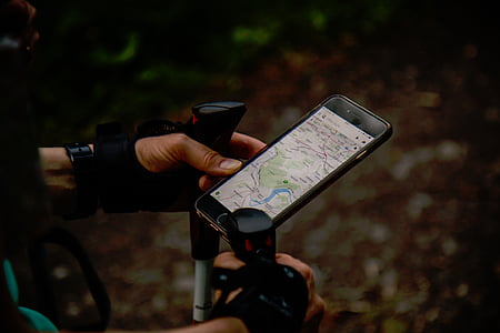 black Android smartphone on black exercise equipment thumbnail