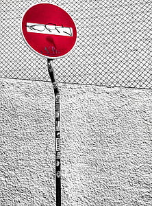 red and gray steel signage on gray surface thumbnail