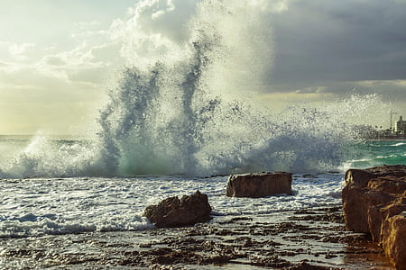 water splashes on stones thumbnail