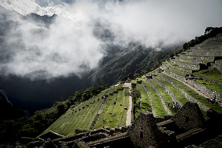 green terraces covered with smoke during daytime thumbnail