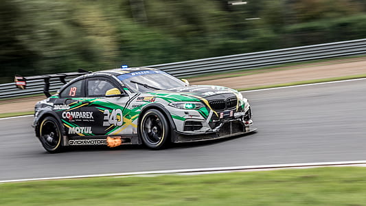 sports photography of racecar on track thumbnail