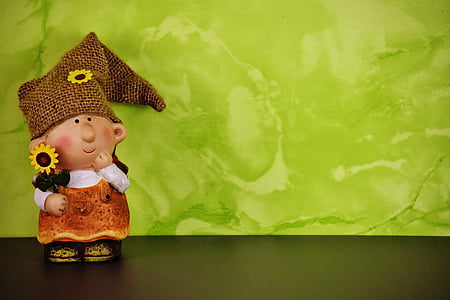 girl with sunflower figurine thumbnail