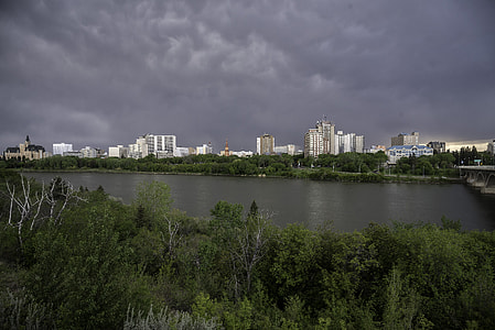 Full Skyline of Saskatoon under the clouds and skies thumbnail