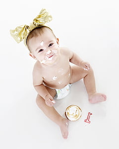 baby with cream on his face thumbnail