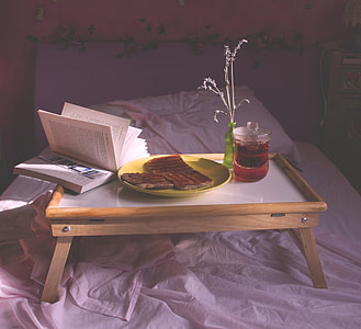 brown wooden tray with book and dish thumbnail