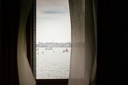 window view of body of water thumbnail