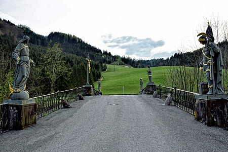 empty gray concrete pathway during daytime thumbnail
