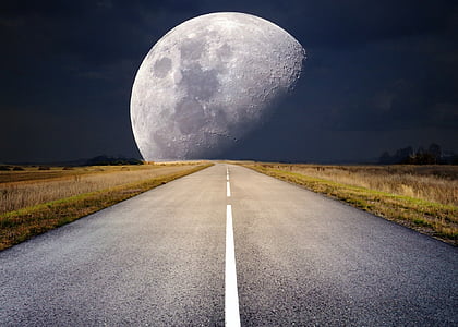 pathway in between grass field with moon background thumbnail