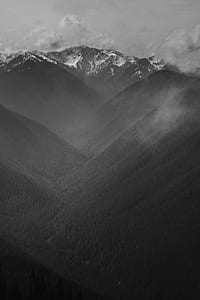 cloudy sky on top of mountain thumbnail
