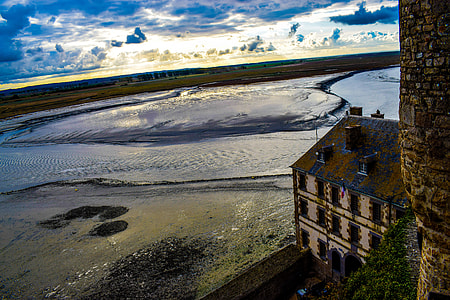 bird's-eye view of brown building under blue skies thumbnail