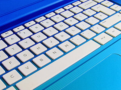 blue laptop with white keyboard thumbnail