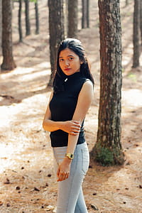 Woman Wearing Black Sleeveless Shirt thumbnail