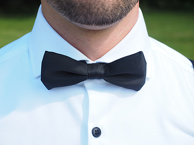 man wearing black bowtie thumbnail