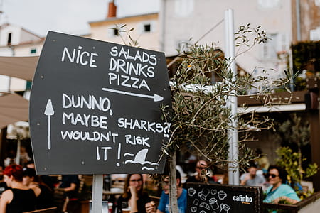 A funny sign encouraging you to visit the restaurant thumbnail