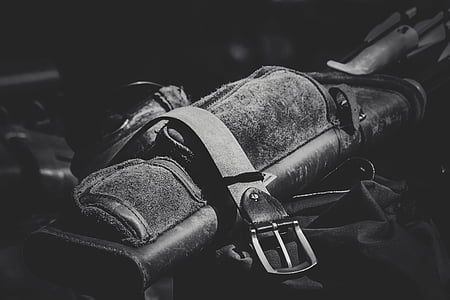 grayscale photo of black bag thumbnail