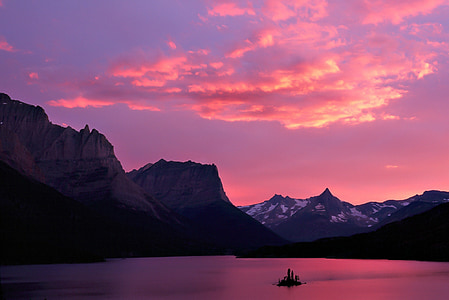 landscape photography of mountain across body of water thumbnail
