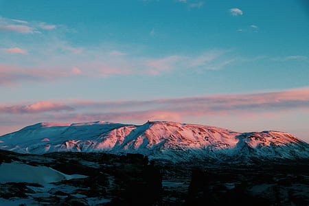 snow capped mountain during daytime thumbnail