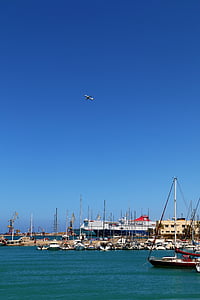 ships on body of water during daytime thumbnail