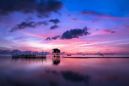 photo of reflecting sun on clear water thumbnail