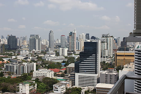 concrete high-rise buildings at daytime thumbnail