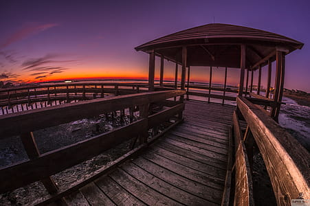 Brown Wooden Pagoda Under Golden Sky thumbnail