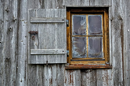 photo of clear glass window with brown wooden frame thumbnail