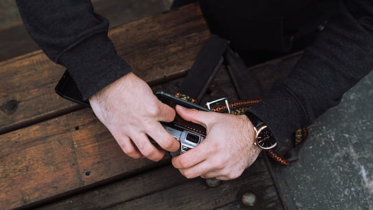 man holding camera thumbnail