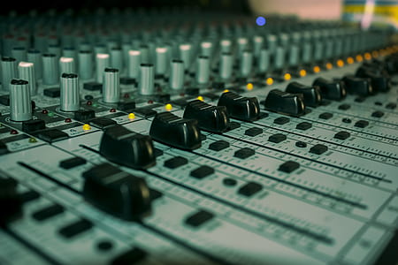 tilt-shift photography of gray audio mixer controller thumbnail