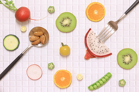 top view of sliced fruits and vegetable on table thumbnail