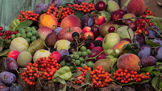 pile or peaches, apples, berries and passion fruits thumbnail