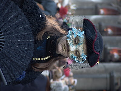 woman wearing masquerade mask thumbnail