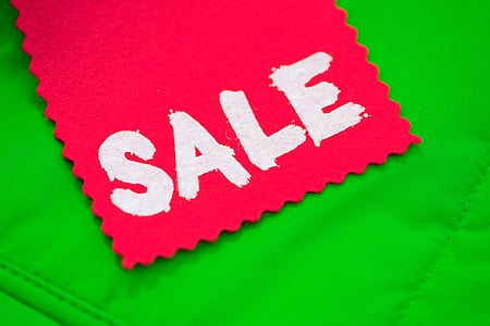 red clothe with Sale text overlay on green surface thumbnail