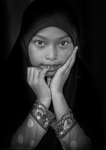 grayscale photo of woman holding face thumbnail