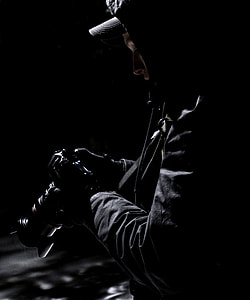closeup photo of person holding camera thumbnail
