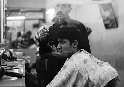 man having a haircut thumbnail